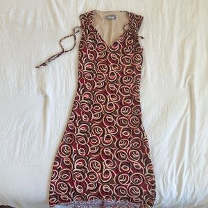 Beautiful rave dress with adjustable tie straps. Fits best as S.